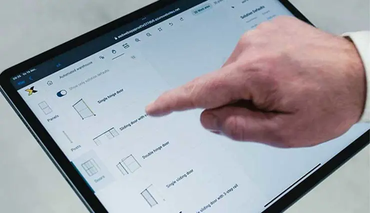 A finger pointing on a tablet